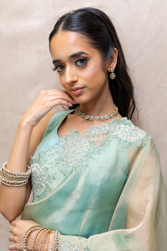 Close-up of Vihana Necklace Floral Crystal Detail and Soft Green Stones - Premium Modern Heirloom.