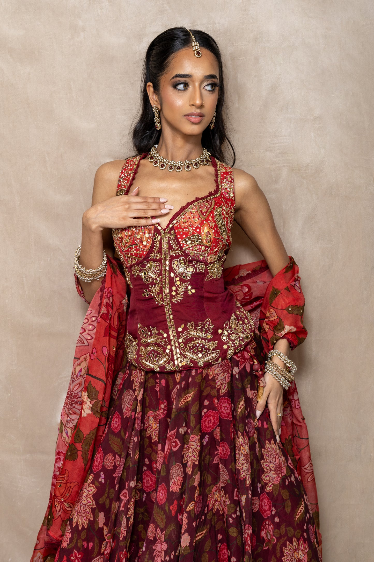 Rivya Ruby Red Kundan Choker Set - Styled with Maroon Corset Lengha - Traditional Maroon Stone Indian Style Jewellery - Wedding Guest Statement Set London.